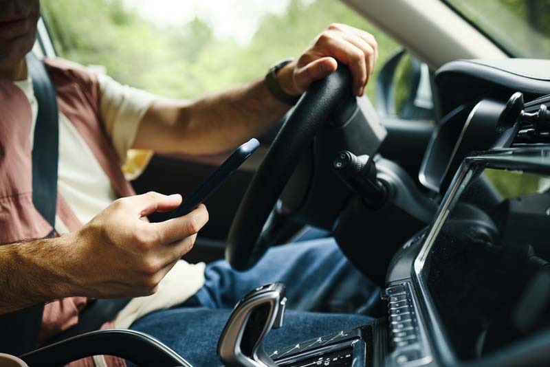 Distracted Driving Laws – Phone Use Restrictions and Traffic Penalties